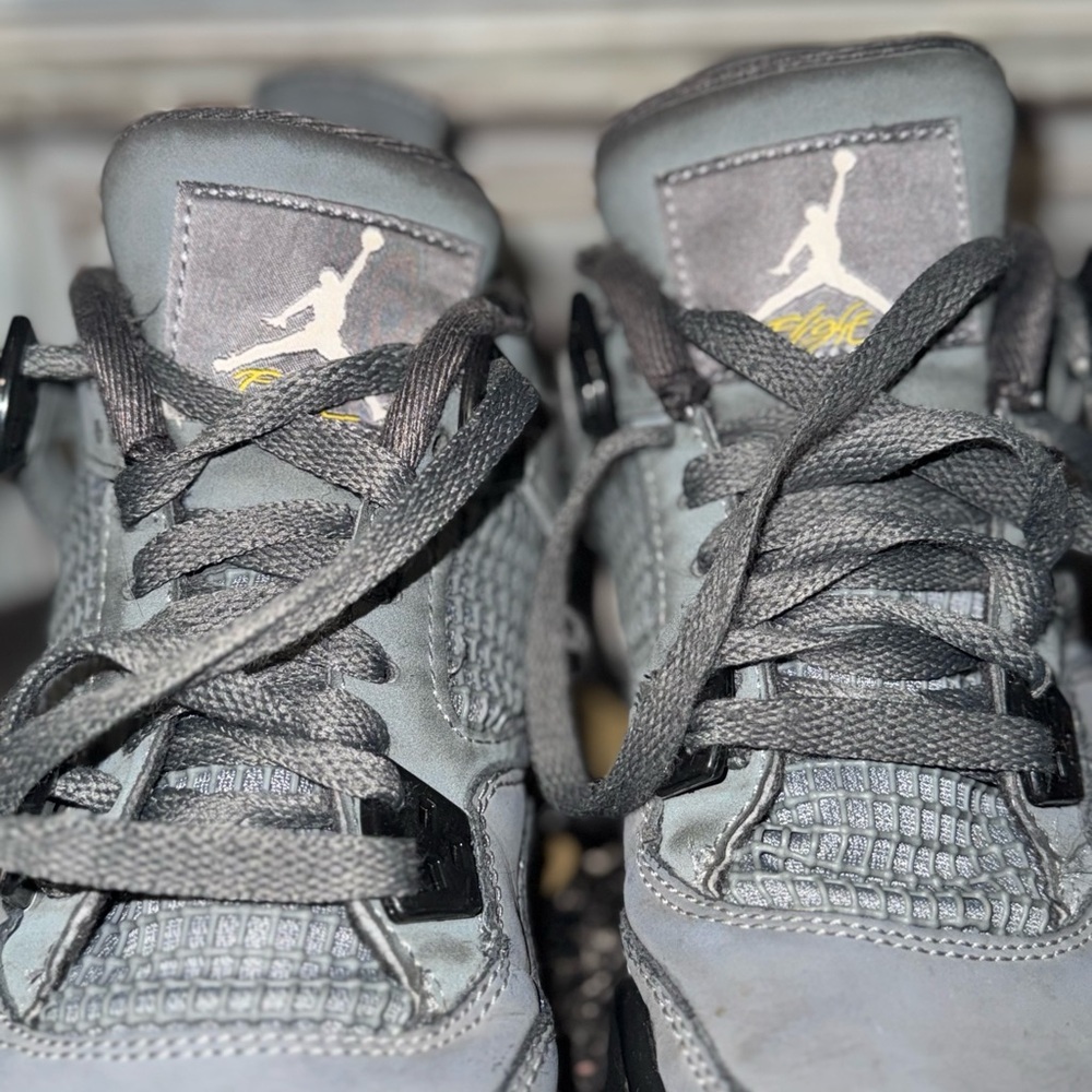 Nike Air Jordan Retro 4s - I think -Gray Sneakers with Yellow Detail